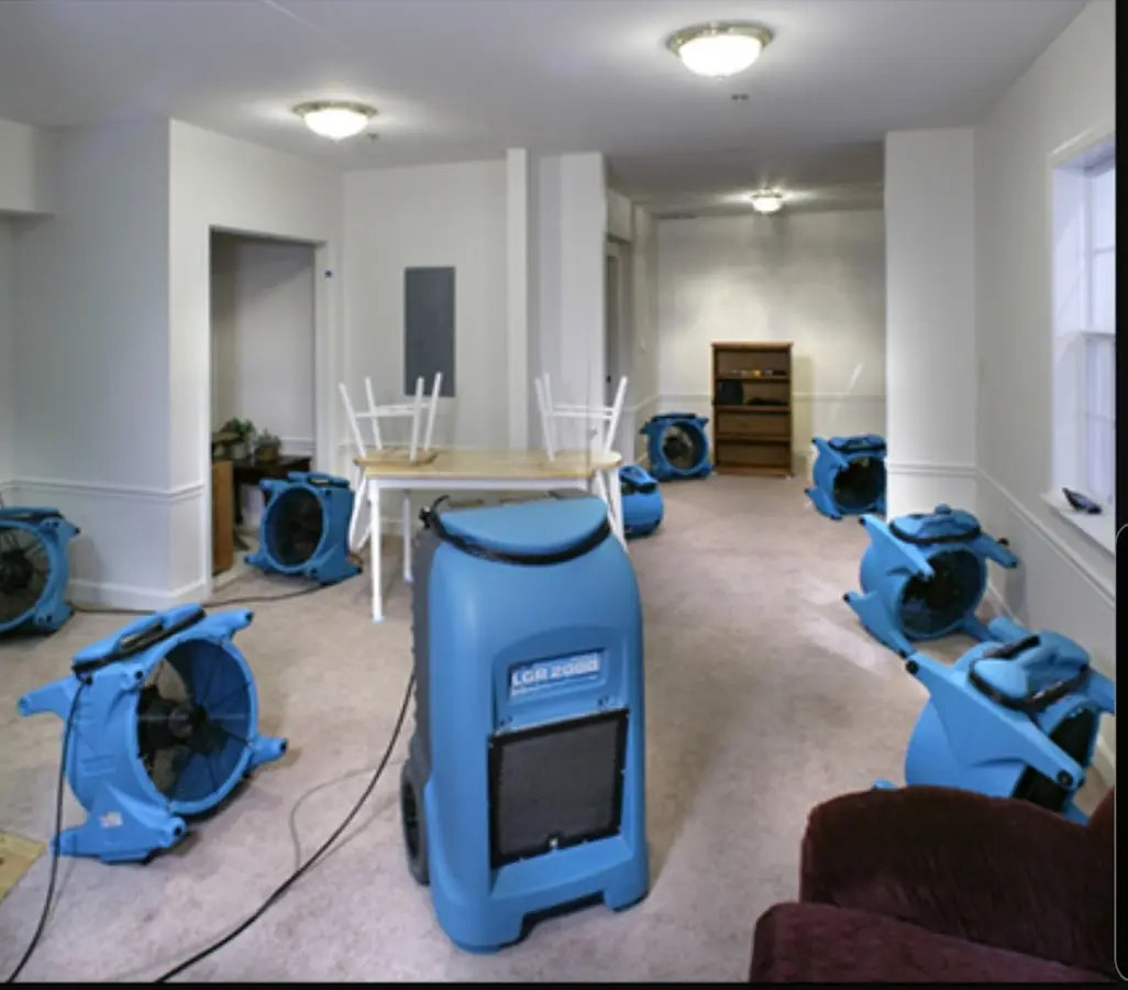 Air movers and dehumidifier setup for Water Extraction & Removal in Walton